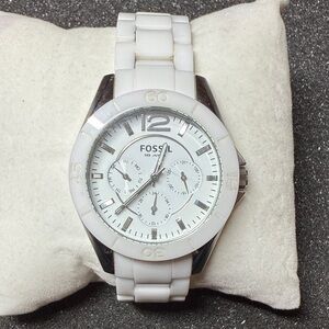Fossil white ceramic watch. With silver accent.